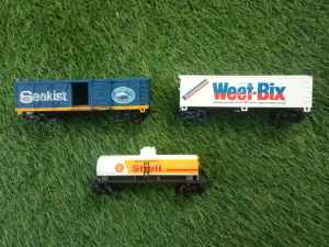 Three HO mixed wagons. Model train.