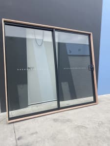 NEW! Aluminium sliding door 2140h x 2450w in black with reveal 