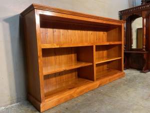 Nearly new solid wood low line bookcase with shelves adjustable