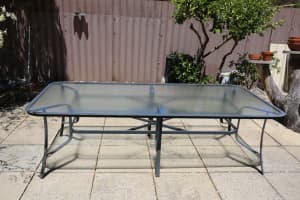 Glass top eight seater patio/outdoor table