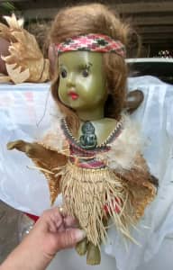 Vintage Maori doll in costume w Tiki necklace & feathered cape