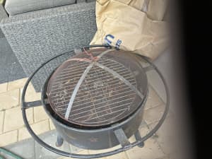 Fire pit/ BBQ . Only used a few times. Free standing