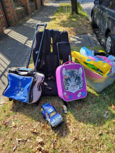 Various Items- roller cases, car seat, pool blow up toys