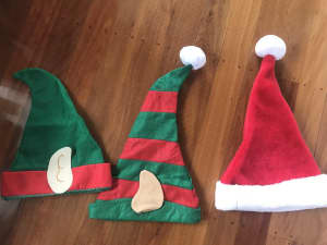 1 Santa hat, 2 elf hats