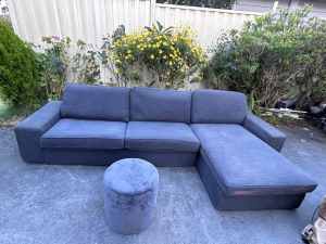 ikea dark grey color L shape sofa with ottom