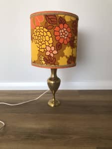 Retro lamp on an engraved brass stand