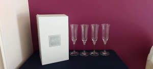 As new, in box, Mikasa crystal champagne flutes, glasses