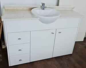 Bathroom vanity, Caesarstone top, ceramic bowl and single lever tap