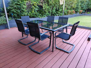7 piece outdoor dining setting (glass table and 6 chairs)