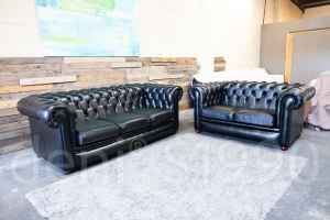 Gascoigne Black Leather Chesterfield Lounges. Excellent Condition