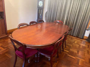 Solid wood dining table and 8 chairs
