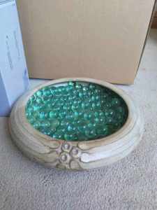 decorative pottery bowl with marbles