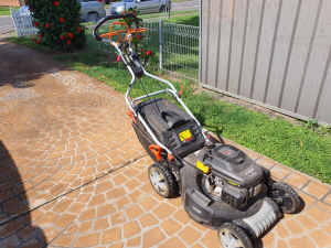 Used self-propelled lawn mower