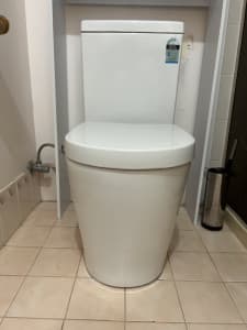 Complete Brand new Toilet still in the box P trap go straight to wall
