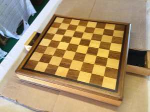 Chessboard with two drawers to hold pieces
