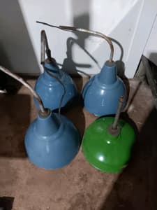 1960s pressed iron light lamps