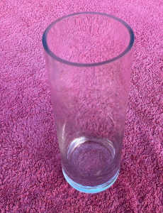 Cylindrical glass vase. 25 cm tall, 9 cm diameter. Kaleen