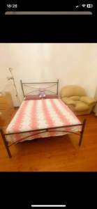 Iron double size bed with mattress for sale in Sydney