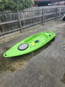 Single Kayak with paddle