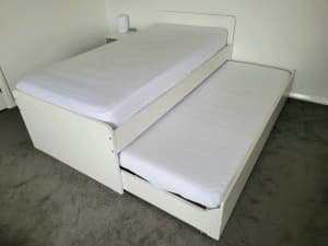 Ikea single Slakt bed frame with underbed, storage and 2 mattresses