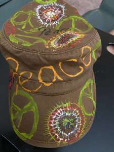 HAND PAINTED CAP WITH VIBRANT COLOURS AND DESIGNS