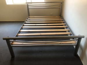 Queen Silver bed with Mattress.