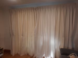 Cream pleated blackout curtains - 2x halves