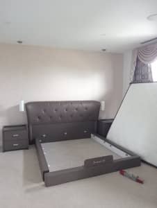 Nearly new King size bed with two bedside tables