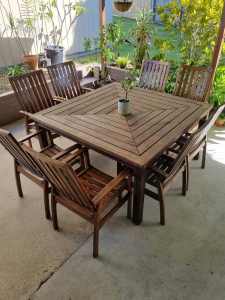 Outdoor 9 piece wooden table and chair setting