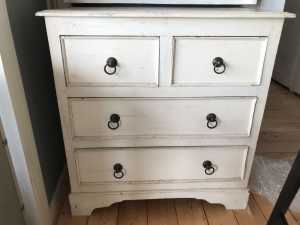 Chest of shabby chic white painted solid wood drawers