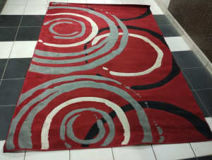 Medium area rug dark red colour for sale