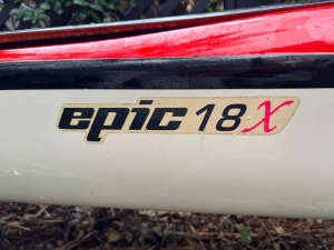 Epic Kayak 18X with Stealth paddle, skirt and transport wheels