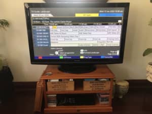 Panasonic TV and DVD player including cabinet