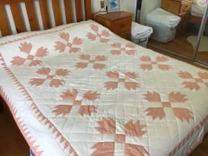 Vintage handmade quilt in “Bears Paw” pattern for double bed