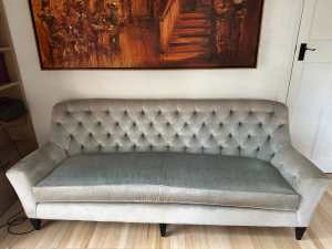 Silver tufted velvet three-seater sofa