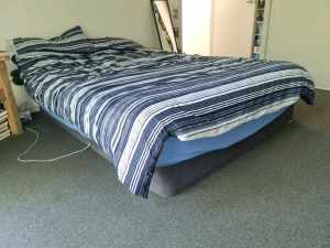 Used queen bed base