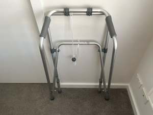 Mobility aid -light weight folding support frame. In new condition.