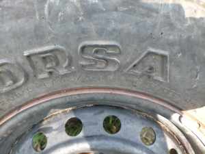 A wheel with tyre LT265/75/16
