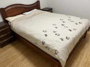 Queen bed with solid wood frame and mattress