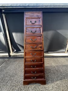 Excellent condition pagoda shape solid Teakwood chest with 9 drawers