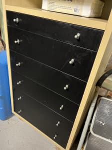 Tall cupboard with drawers