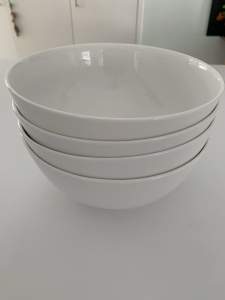 Four large white bowls