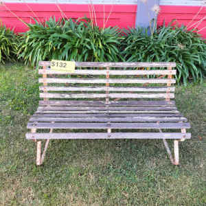 Classic vintage timber and metal garden bench seat. 