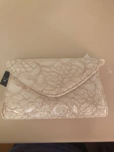 Ladies Clutches all $18 different colours black/gold/silver and white 