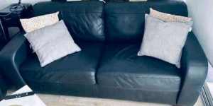 Black leather lounge with pull out sofa bed recliner chair