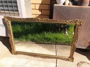 Antique ornate bevilled mirror in exceptional condition. Very heavy. 