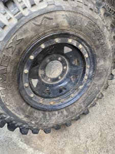 Centipedes tyres off road near new