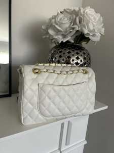 Brand new white quilted turnlock handbag