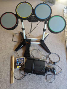 PS3 console with Rock Band Drum Kit original drum kit box Working