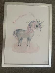 Unicorn print in silver frame.
